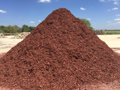 Use Red dyed Mulch For Dressing Up Landscape Yard And Garden
